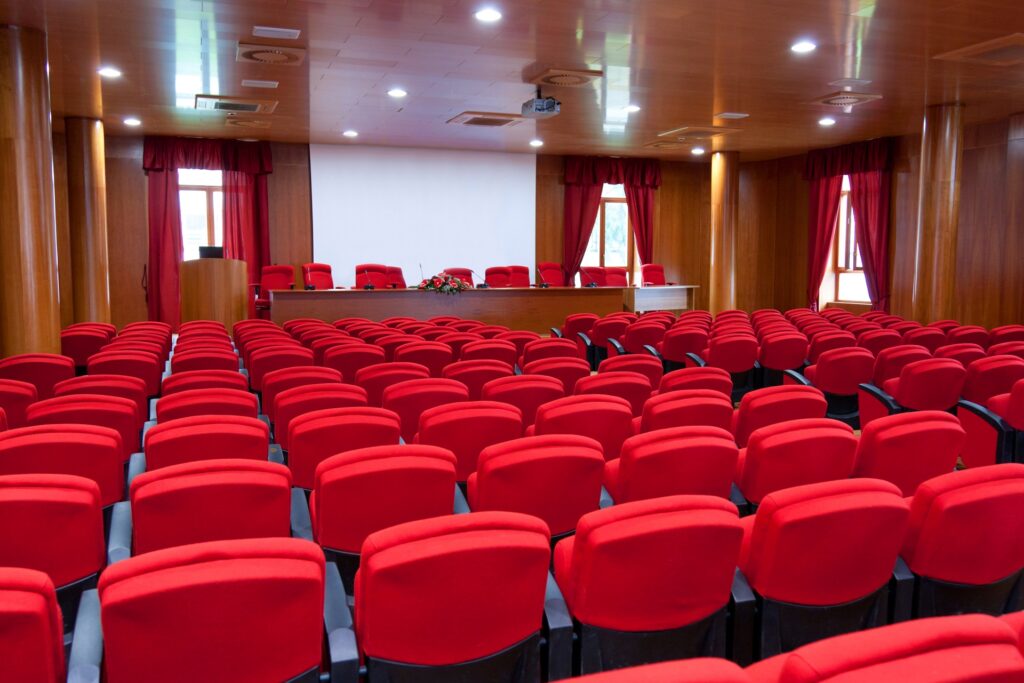 Conference centre with red armchairs